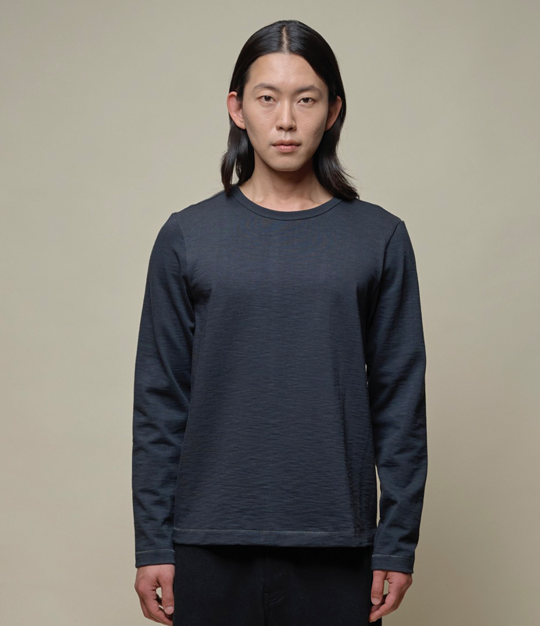 man wearing heavyweight longsleeve in charcoal