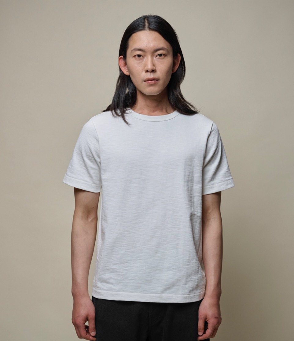 man wearing heavyweight t-shirt in white